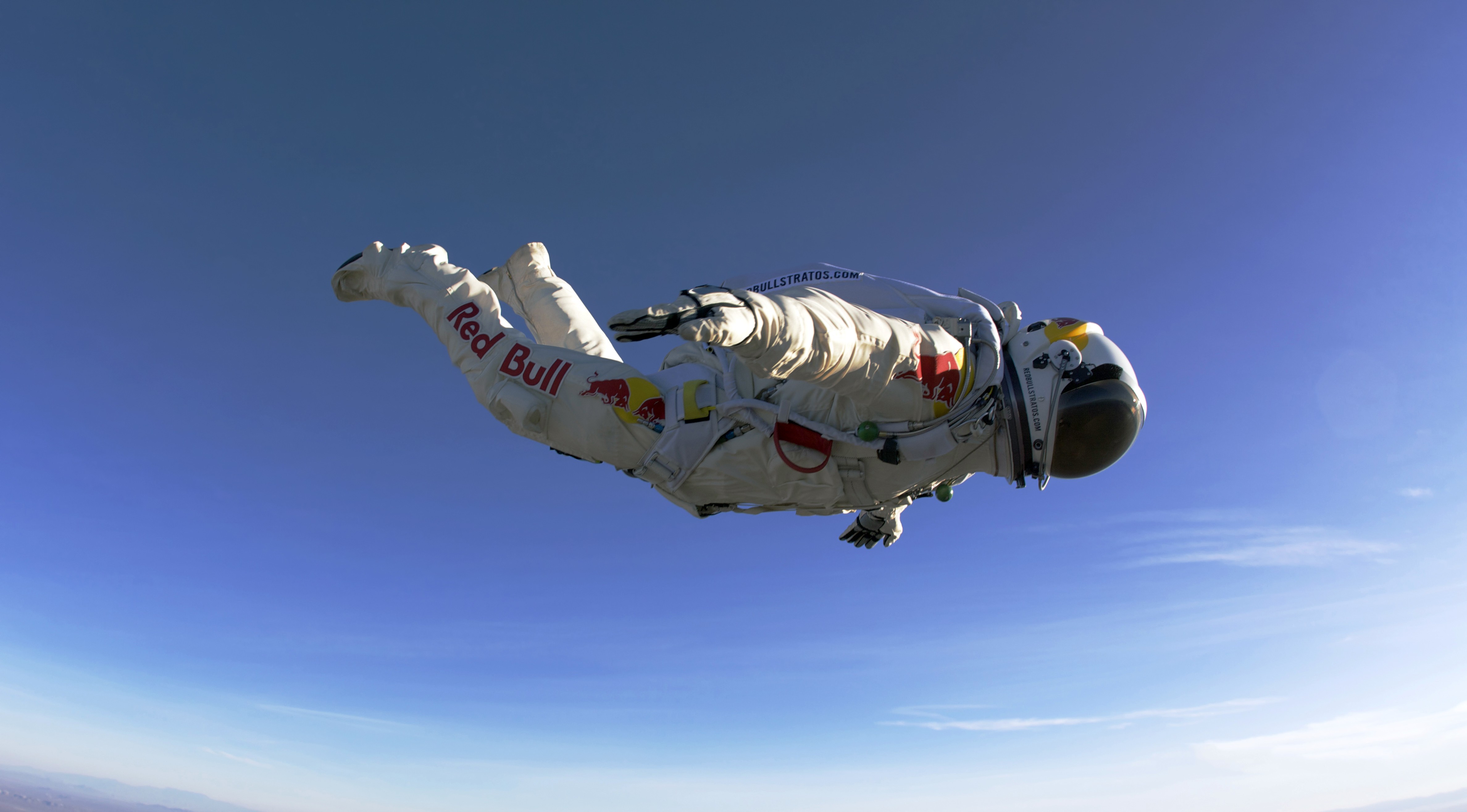 spacesuit men sky red bull felix baumgartner falling flying skydiving