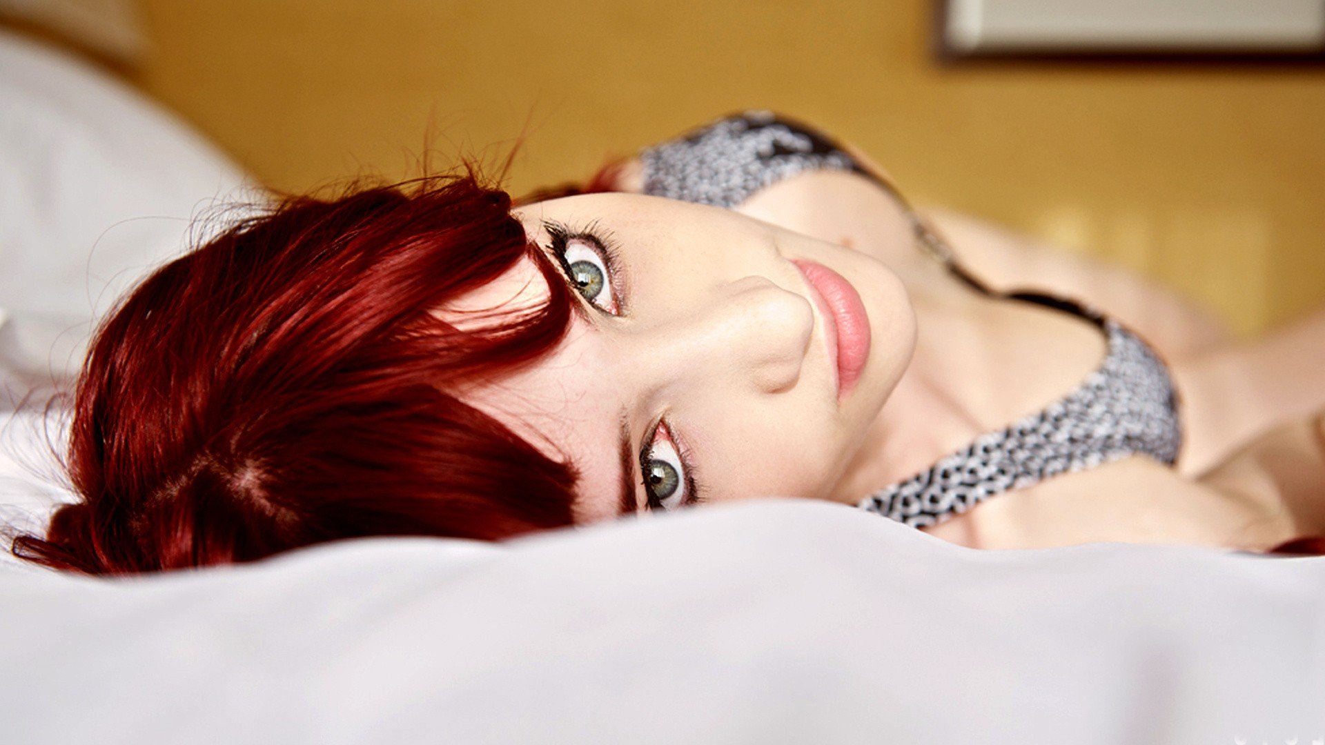 Cute Redhead Girl Puts On A Bedroom