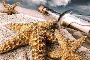 Bottle And Sea Star In Beach