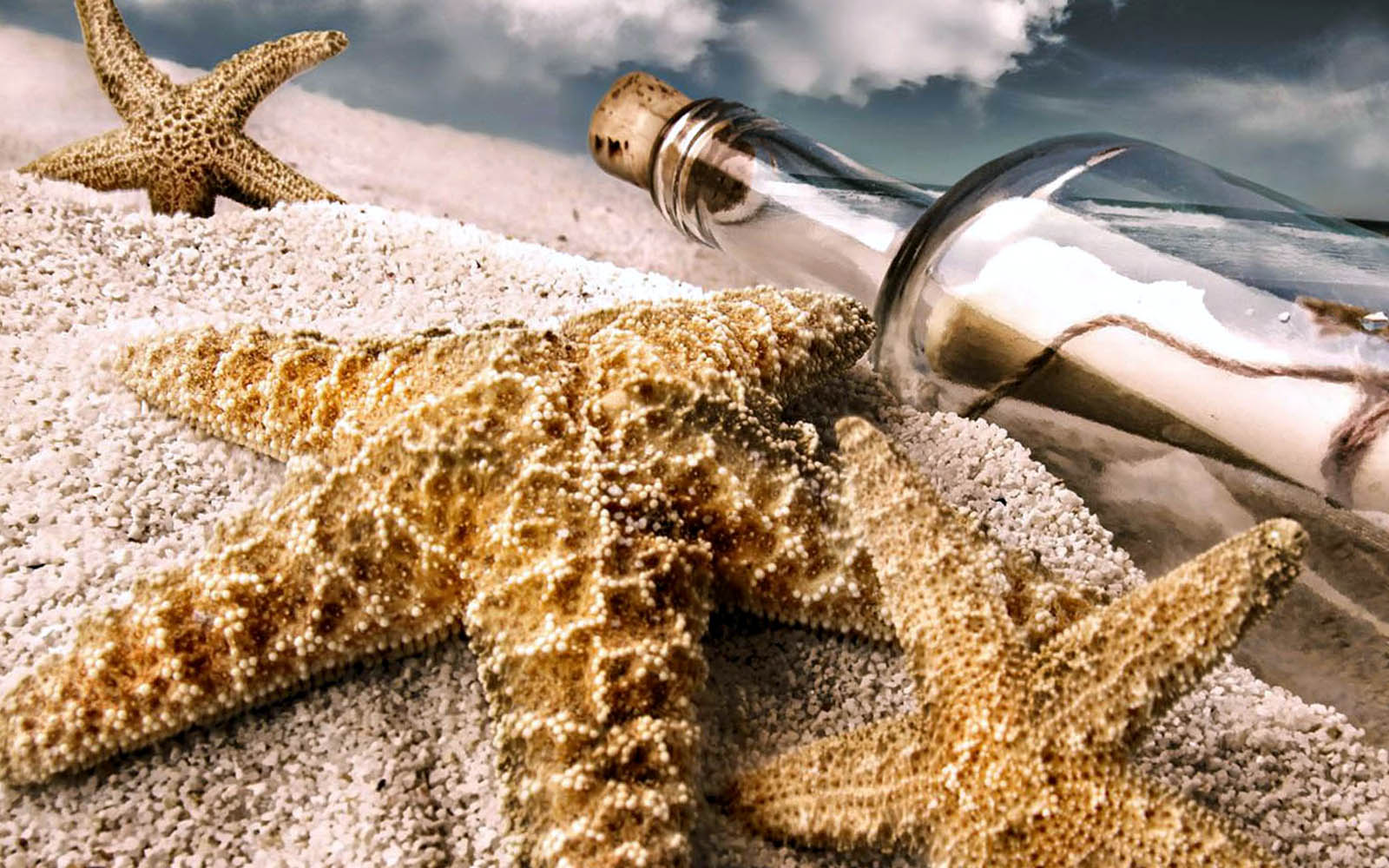 Bottle And Sea Star In Beach Wallpaper