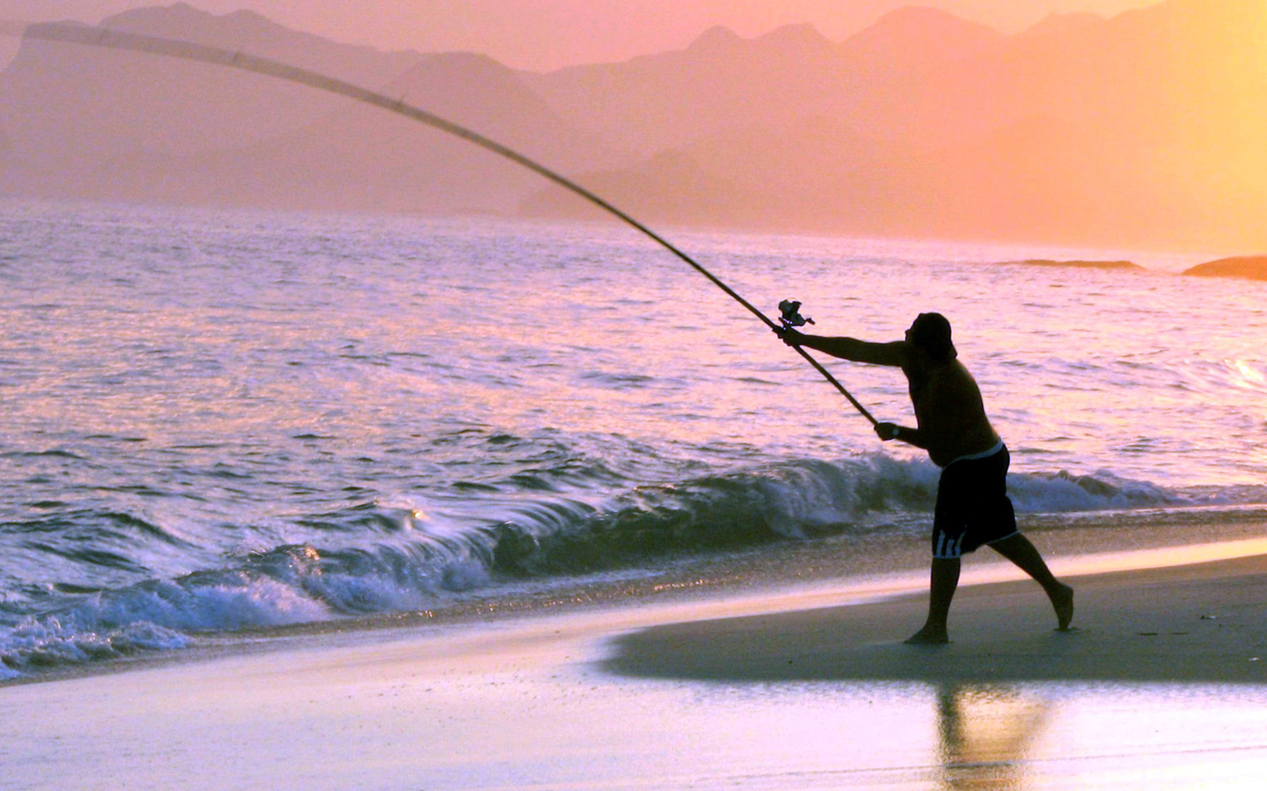 Fishing at Beach Sunset Wallpaper