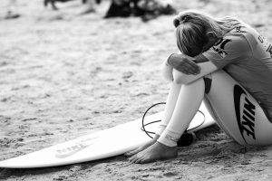 Nike Girl Surfboard in Beach
