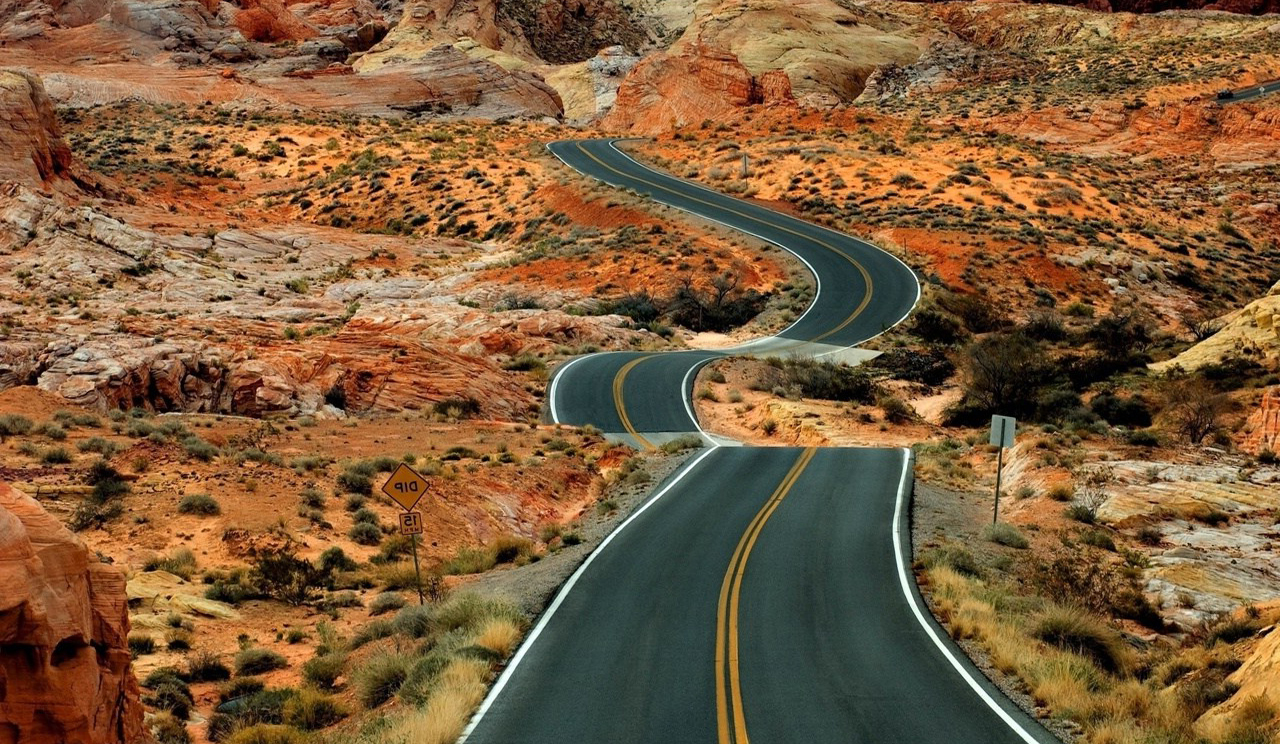 Curved Road At The Desert Wallpaper