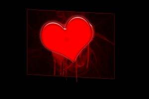 Red Heart On The Black Background