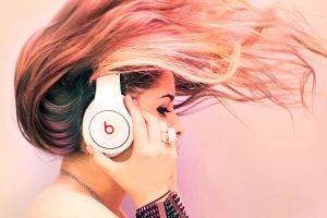 Blonde Women With A Headphone