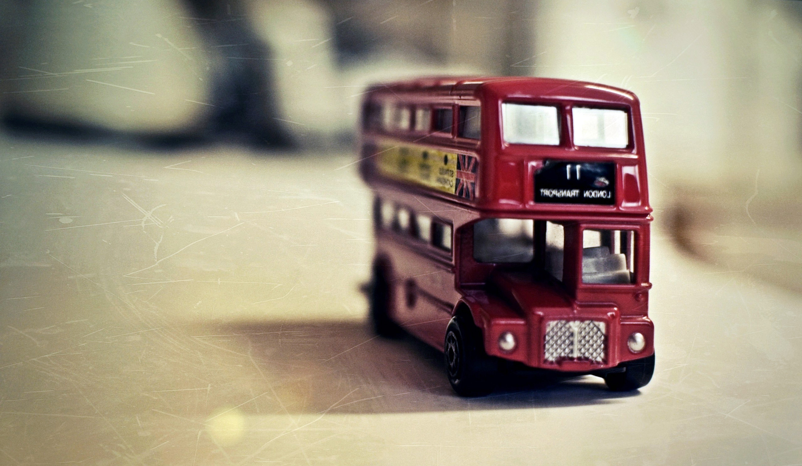 Red British Toy Bus Wallpaper