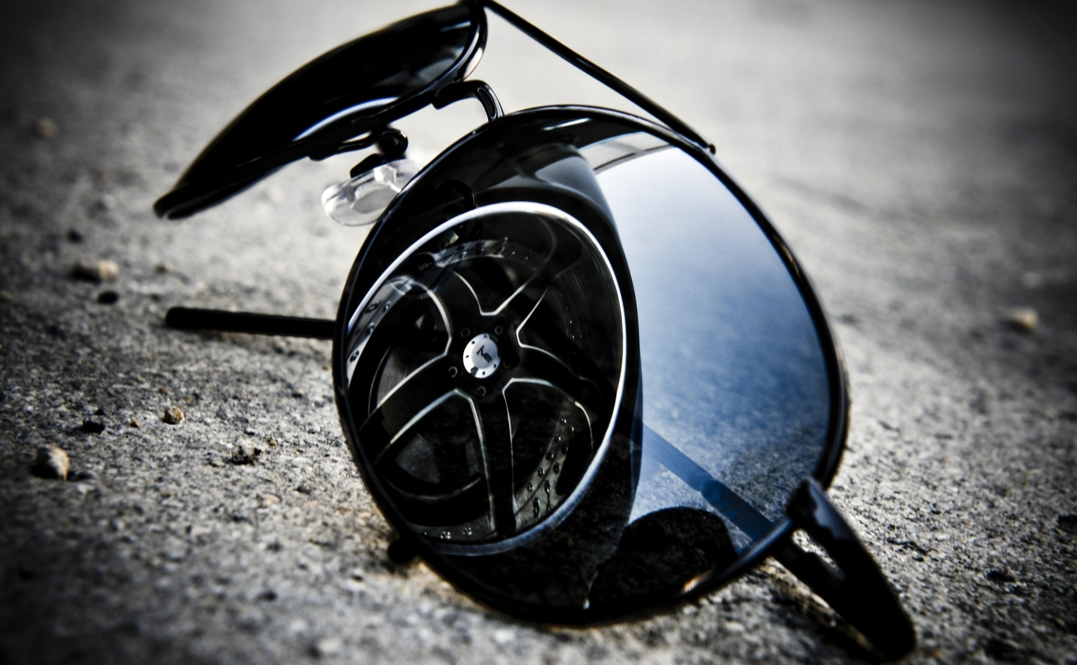 Sunglasses Reflection And Car Tire Wallpaper
