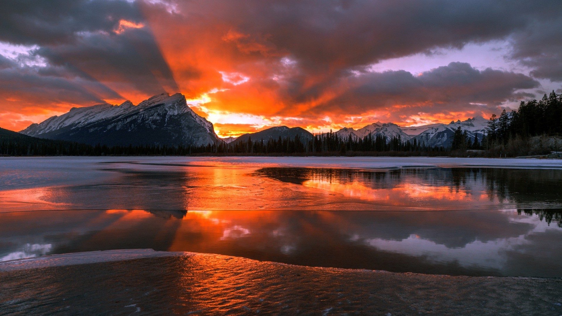nature, Landscape, Mountain, Canada, Alberta, Snow, Winter, Trees, Forest, Water, Lake, Sun, Clouds, Pine Trees, Frozen Lake, Ice, Sunset, Snowy Peak, Reflection Wallpaper