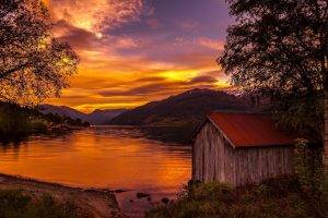 nature, Landscape, Boathouses, Lake, Sunset, Norway, Trees, Mountain, Sky, Clouds, Shrubs, Water, Gold