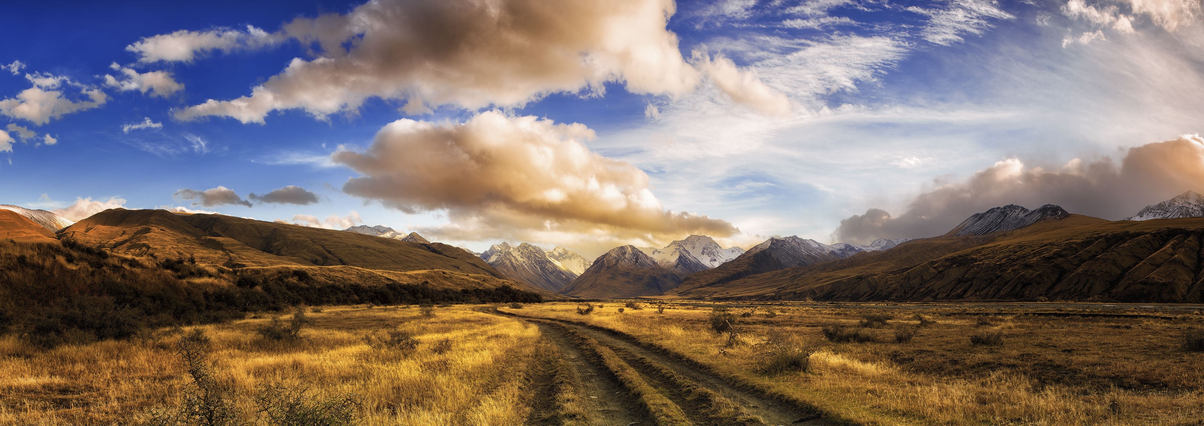 nature, Landscape, Panoramas, Dirt Road, Dry Grass, Mountain, Clouds, Shrubs, Sunset, Snowy Peak, New Zealand Wallpaper