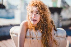 women, Model, Redhead, Long Hair, Bare Shoulders, Freckles, Wavy Hair, Curly Hair, Open Mouth, Looking Away, Couch, Windy, Hair In Face, Depth Of Field