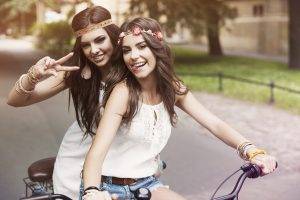 women, Model, Brunette, Long Hair, Women Outdoors, Urban, Street, Looking At Viewer, Tongues, Smiling, Open Mouth, Headband, White Dress, Jean Shorts, Trees, Bare Shoulders, Bicycle, Depth Of Field, Winner, Teeth