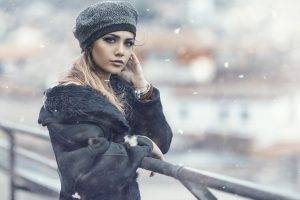 women, Model, Blonde, Long Hair, Women Outdoors, Looking At Viewer, Hat, Coats, Winter, Snow Flakes, Fence, Windy, Depth Of Field