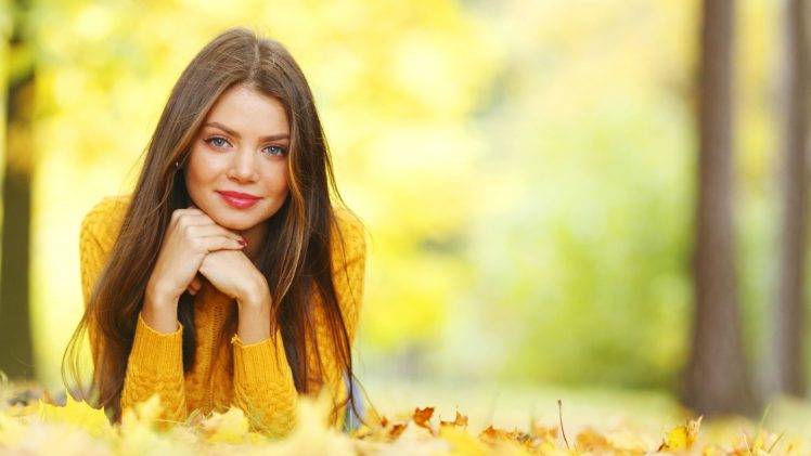 women, Model, Brunette, Long Hair, Women Outdoors, Nature, Face, Portrait, Trees, Smiling, Blue Eyes, Red Lipstick, Sweater, Leaves, Fall, Depth Of Field, Lying On Front, Looking At Viewer HD Wallpaper Desktop Background