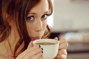 women, Model, Redhead, Long Hair, Looking At Viewer, Face, Portrait, Charlotte Herbert, Chad Suicide, Depth Of Field, Blue Eyes, Cup, Coffee, Drink, Freckles, Blow