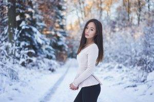 women, Model, Long Hair, Women Outdoors, Looking At Viewer, Nature, Trees, Forest, Sweater, Juicy Lips, Tight Clothing, Winter, Snow, Pine Trees, Asian, Brown Eyes, Brunette