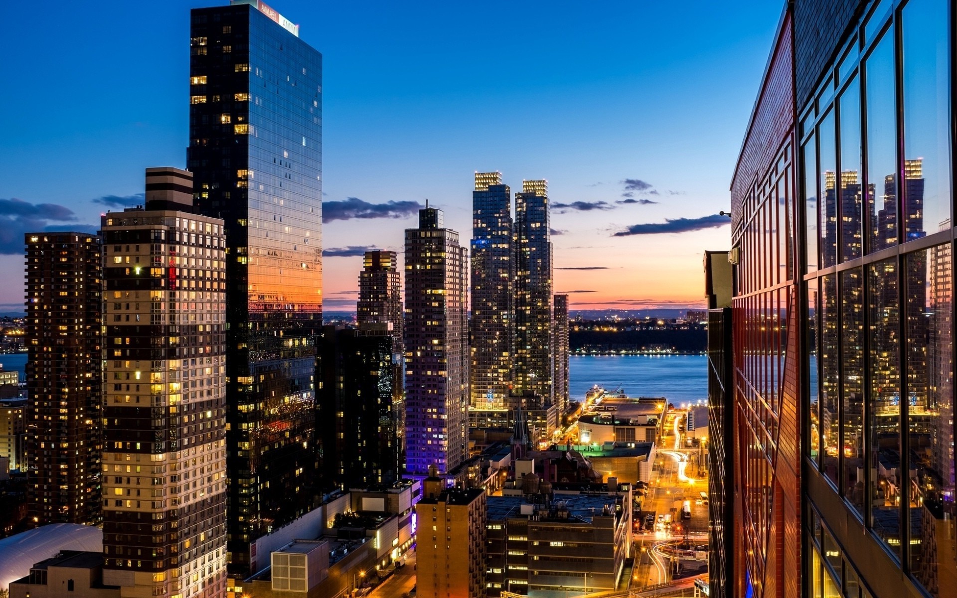 cityscape, Architecture, Building, New York City, USA, Skyscraper, Sunset, Evening, Street Light, River, Window, Reflection, Clouds, Rooftops, Urban Wallpaper