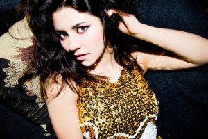 women, Singer, Brunette, Long Hair, Looking At Viewer, Open Mouth, Musicians, Bare Shoulders, Lying On Back, Armpits, Hands In Hair, Marina And The Diamonds, Music, Yellow Dress, Pillow, Brown Eyes