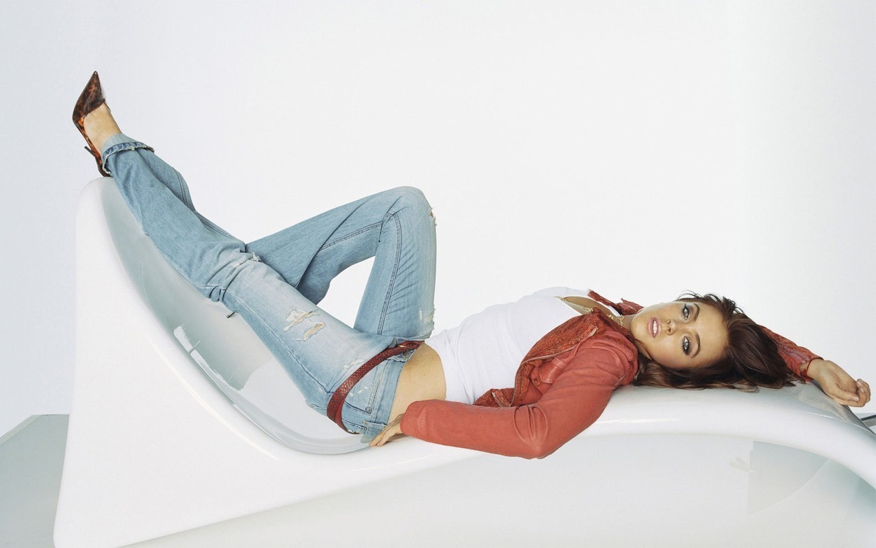 women, Actress, Brunette, Long Hair, Looking At Viewer, Open Mouth, Lindsay Lohan, Lying On Back, Blue Eyes, White Background, Jeans, High Heels, Belt, Leather Jackets, Torn Jeans, Couch Wallpaper