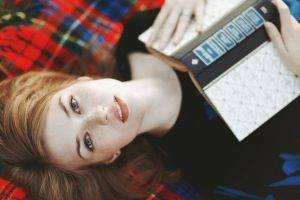 women, Redhead, Freckles, Looking At Viewer, Lying On Back, Books, Tartan