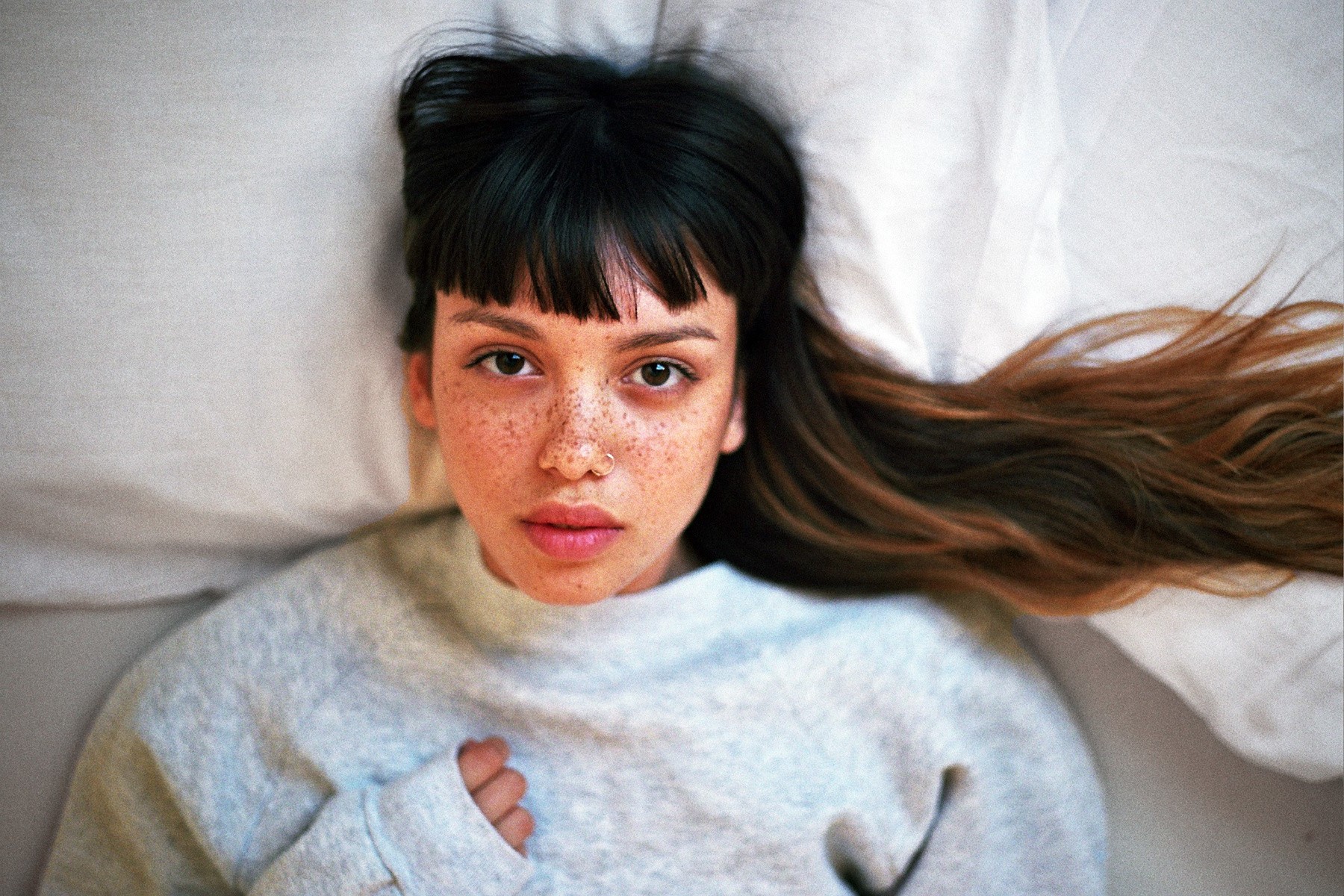 women, Emily Bador, Looking At Viewer, Freckles, In Bed, Lying On Back, Nose Rings, Sweater Wallpaper