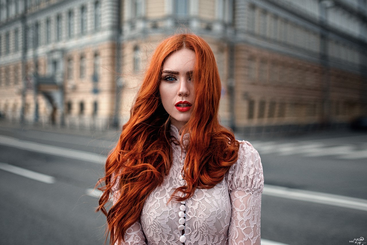 women, Model, Redhead, Long Hair, Women Outdoors, Looking At Viewer, Open Mouth, Blue Eyes, Georgy Chernyadyev, Hair In Face, Wavy Hair, Red Lipstick, Street, Building, Urban, White Clothing, Windy Wallpaper