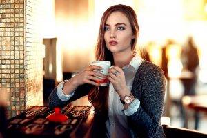 women, Model, Redhead, Long Hair, Alessandro Di Cicco, Looking Away, Blue Eyes, Open Mouth, Sitting, Cup, Blouses, Sweater, Watches, Depth Of Field, Restaurant