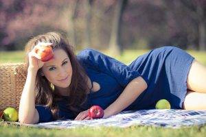 women dress blue dress apples lying down auburn hair