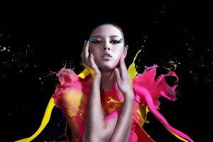 women model asian black background splashes open mouth