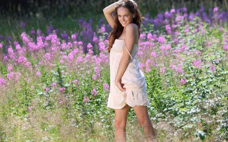 women model women outdoors smiling flowers earrings field nature brunette white dress HD Wallpaper Desktop Background