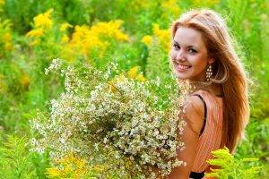 women model women outdoors smiling flowers earrings field nature blonde