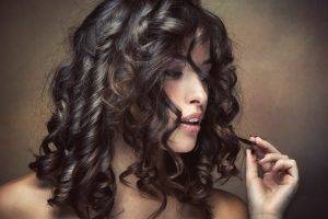 women model face portrait curly hair