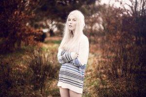 women outdoors arms crossed sweater dress looking at viewer platinum blonde arms on chest