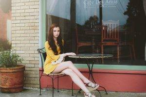 table legs together yellow dress cafes sitting model brunette bricks