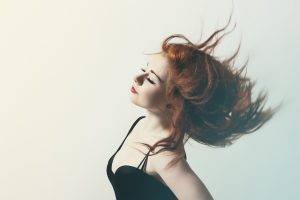 model women redhead black dress