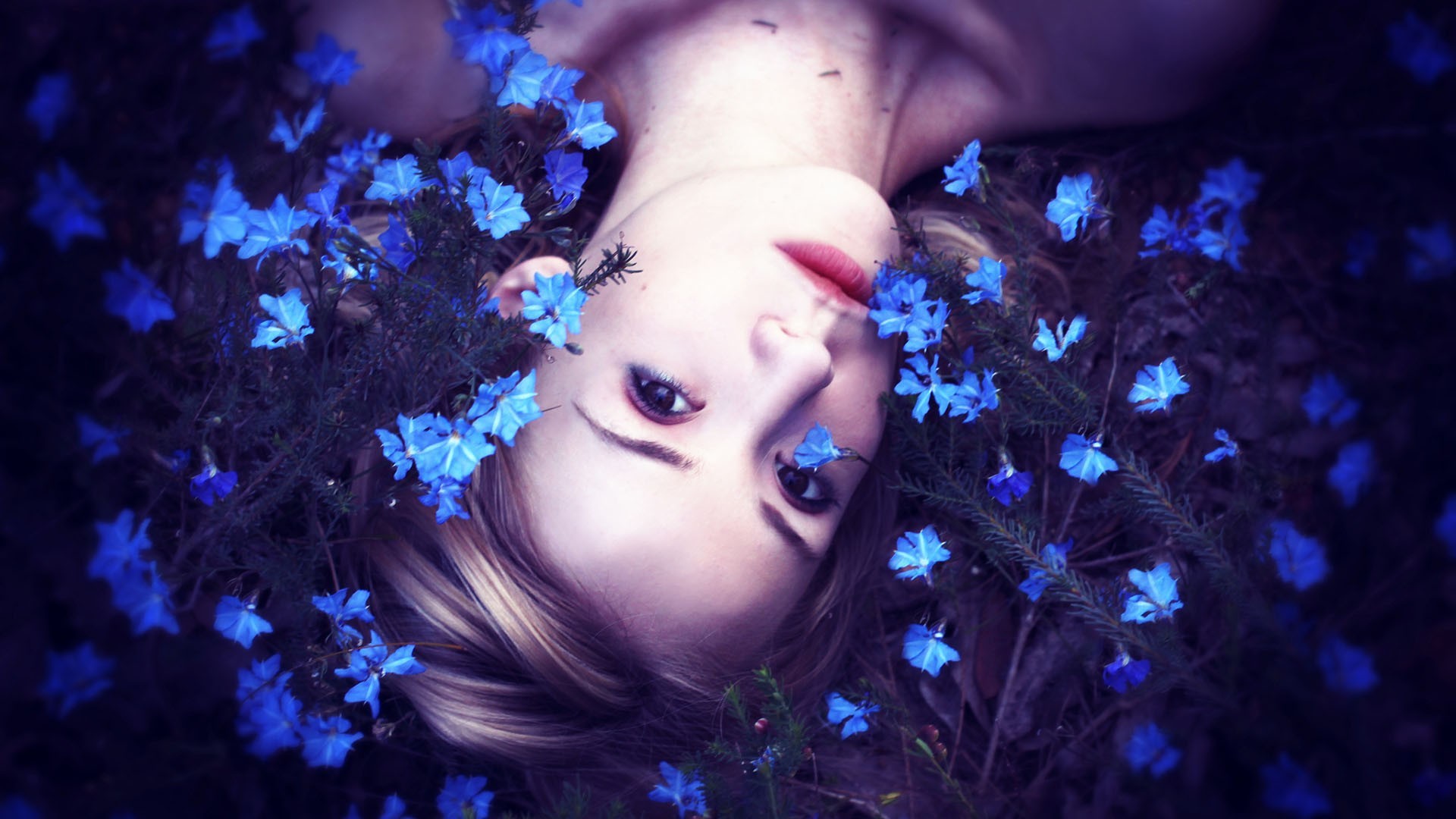 women upside down blue flowers Wallpaper