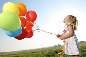 balloons children field colorful blonde