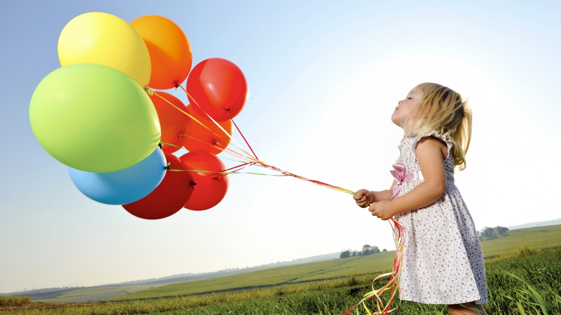 balloons children field colorful blonde Wallpaper