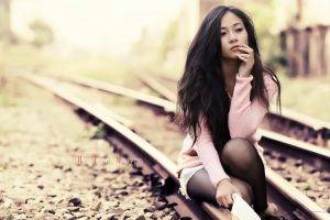 women model brunette long hair asian women outdoors jean shorts stockings sitting sweater railway depth of field