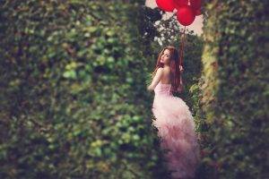 women redhead hedges looking back balloons pink dress