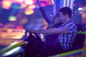 motion blur couple theme parks bokeh