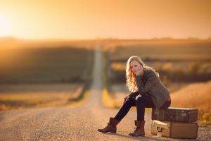 women blonde women outdoors road sunset suitcases sitting jake olson nebraska curly hair