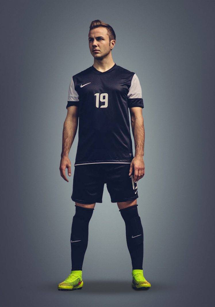 mario gotze soccer germany bayern munchen footballers simple background nike HD Wallpaper Desktop Background