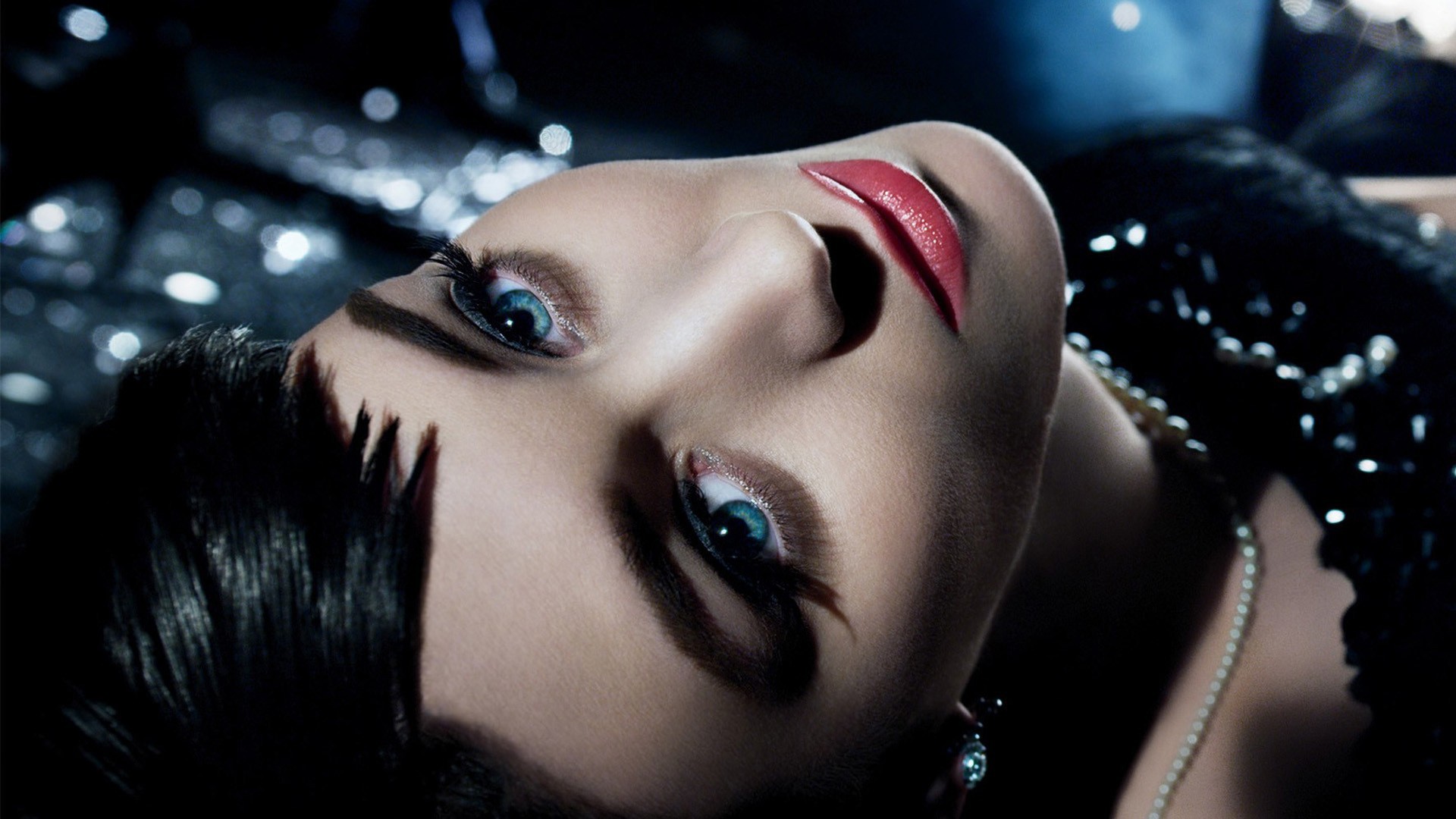 women black hair blue eyes red lipstick closeup pearl necklace Wallpaper