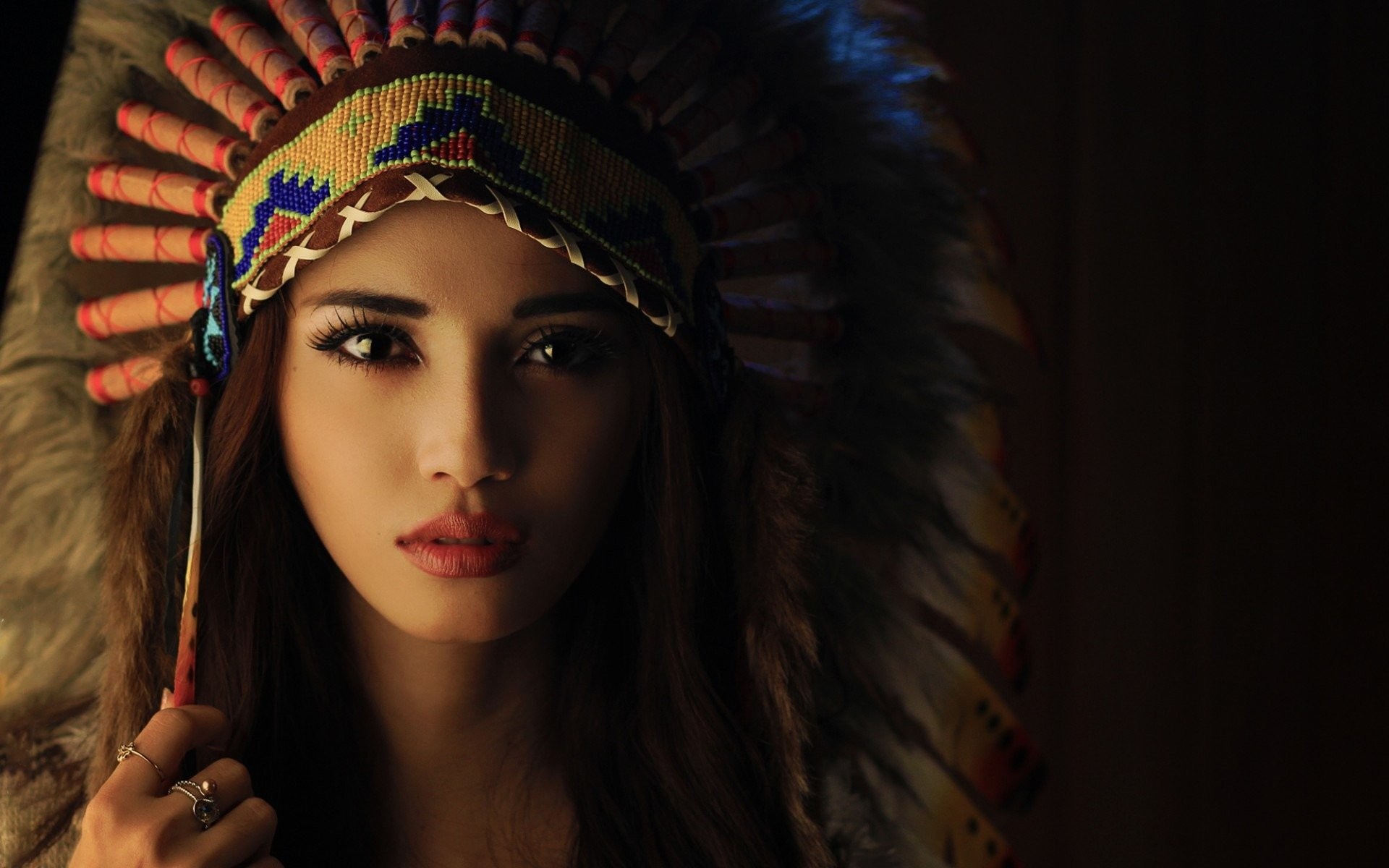 women model brunette face open mouth indian headdress zreck Wallpaper