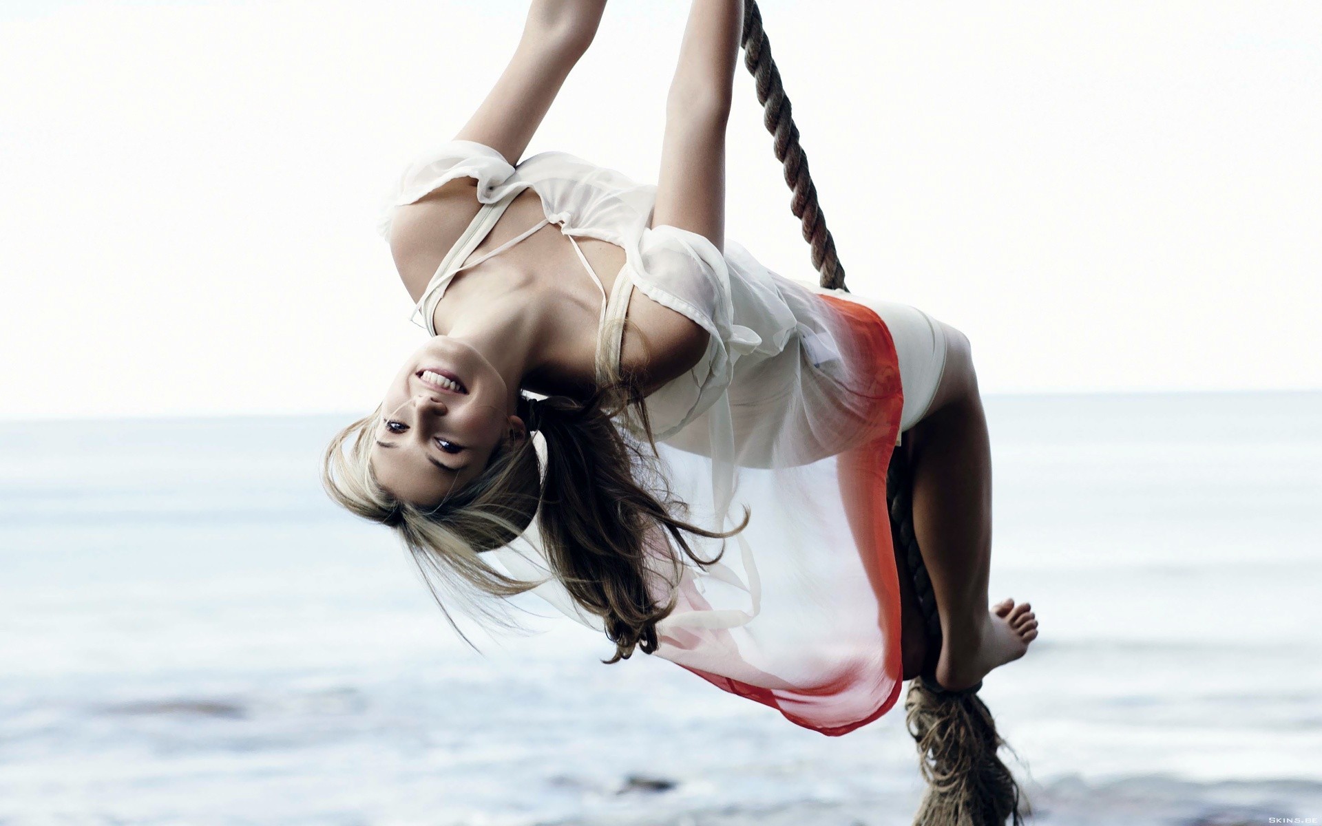 women ropes swings sea upside down barefoot Wallpaper
