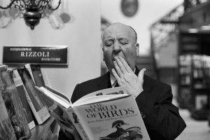 men film directors alfred hitchcock monochrome yawning books suits birds reading