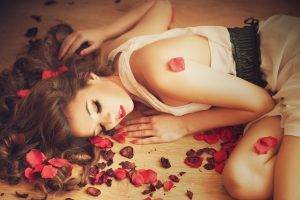 women model brunette long hair closed eyes open mouth white dress on the floor petals sleeping