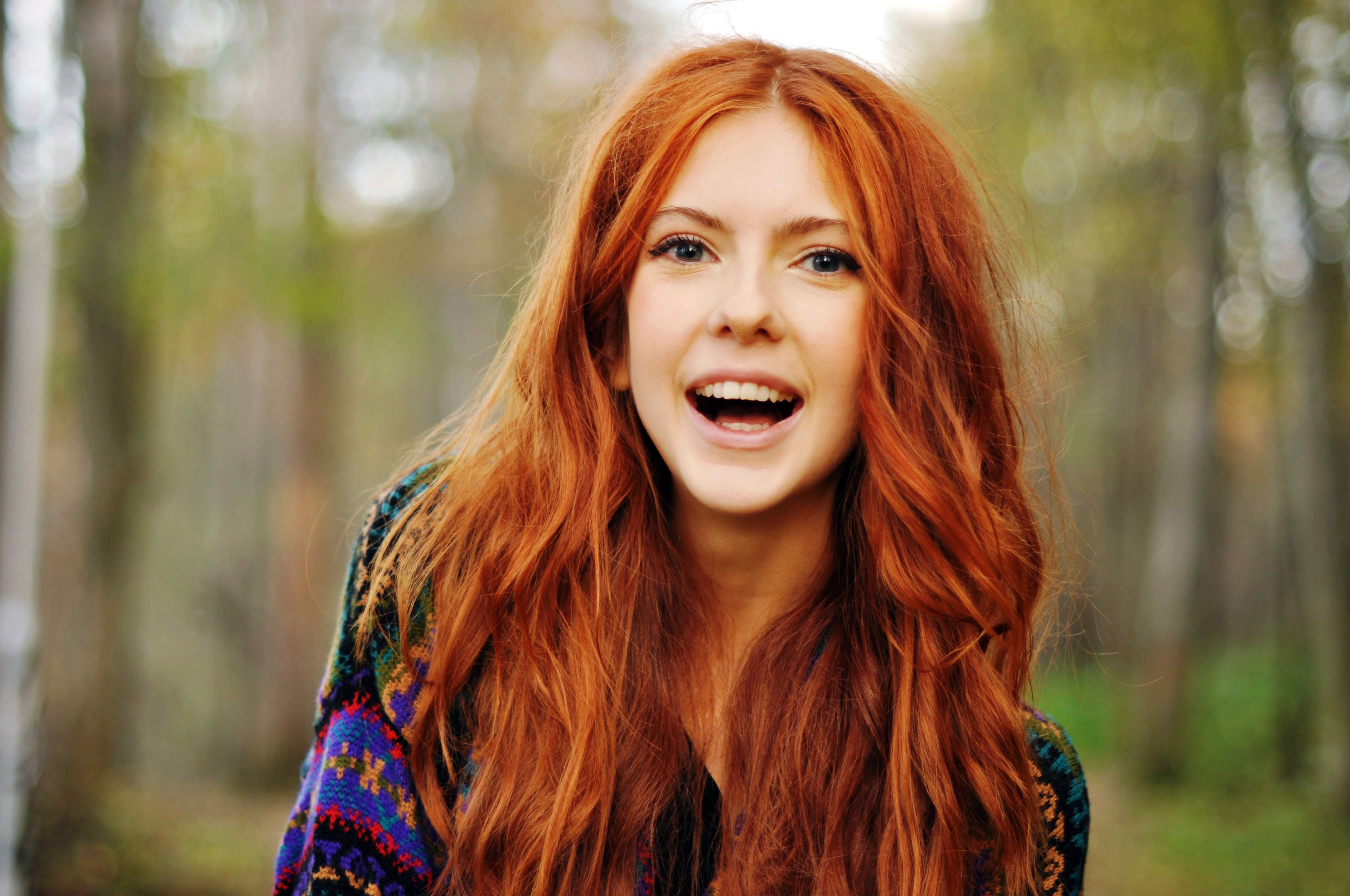 women redhead long hair wavy hair model smiling women outdoors trees sweater blue eyes ebba zingmark Wallpaper