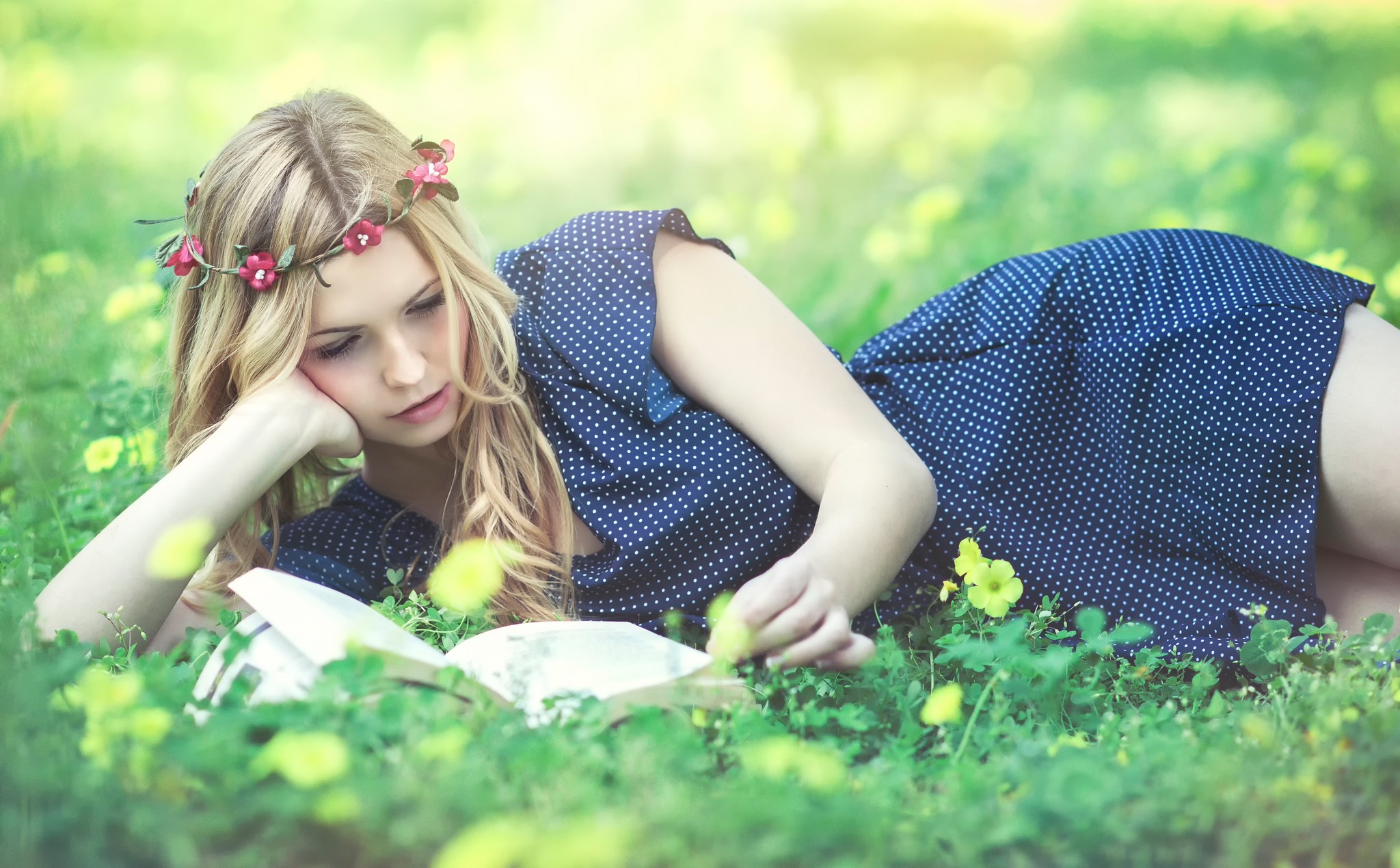 women model long hair women outdoors grass blonde reading flower in hair polka dots blue dress Wallpaper